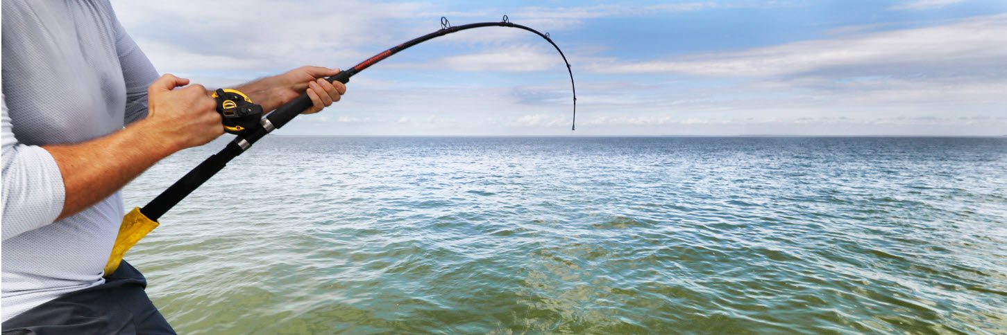 baitcaster rod and reel combo kayak - catching fish on baitcaster