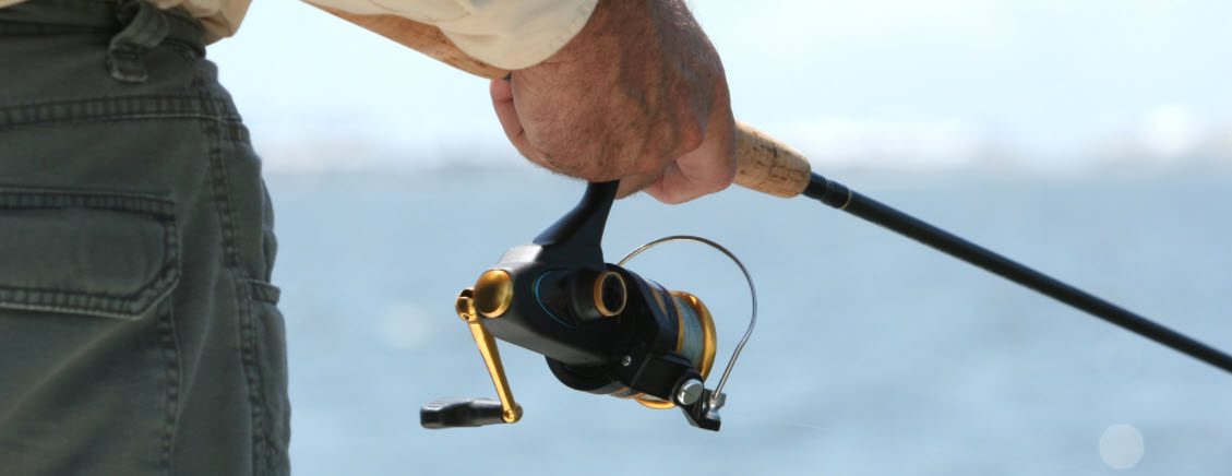 best fishing reels under 50 - man fishing