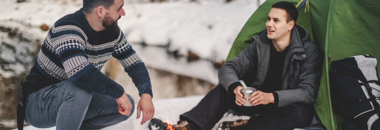 best camping jackets for men - men in snow