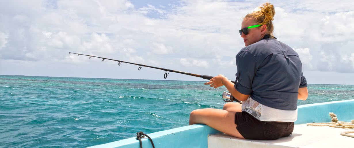 best deep sea rod and reel combos - girl fishing