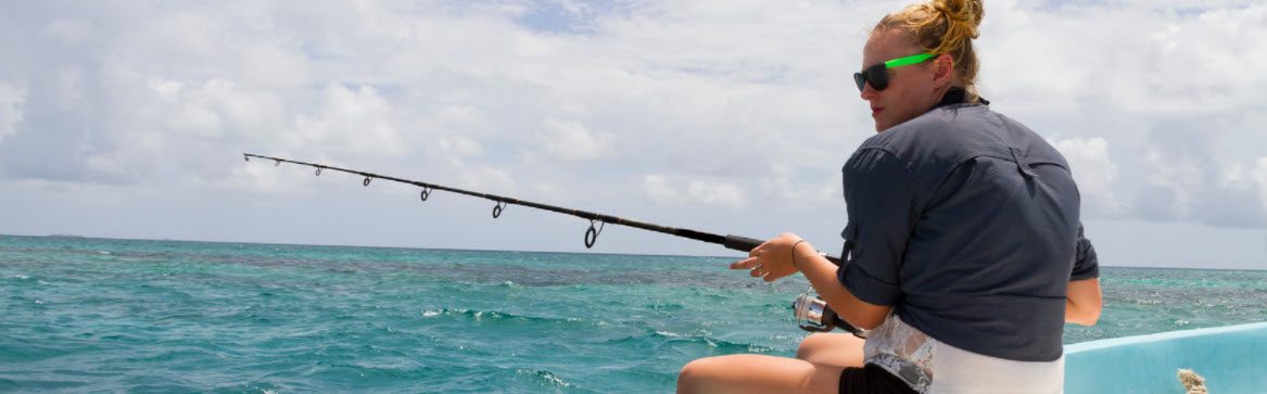 best offshore jigging rods - girl fishing on boat