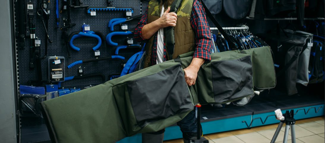 how to ship a fishing rod - man with soft carry bag