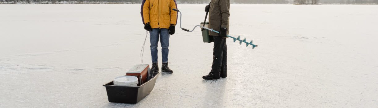 Best Ice Fishing Sleds - Men pulling sleds