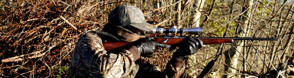 Scent Eliminators for Hunting - Man hunting in bushes