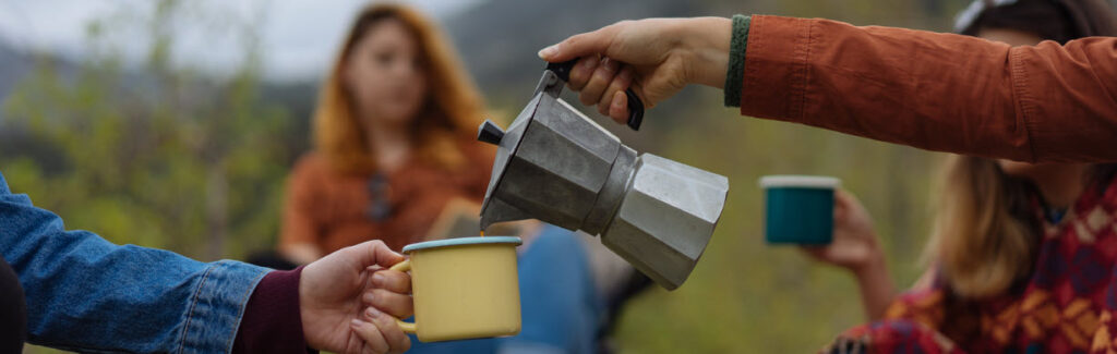 best coffee makers for camping - pouring coffee