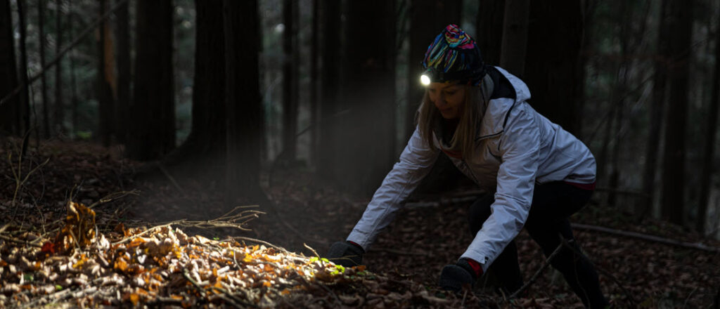 hunting headlamps - woman in wilderness